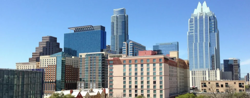 City skyline displaying buildings that need commercial property insurance for protection.