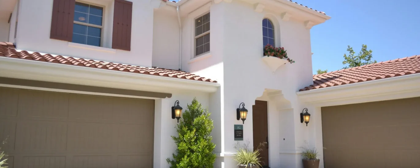 Front view of a suburban house used for homeowners insurance tips post